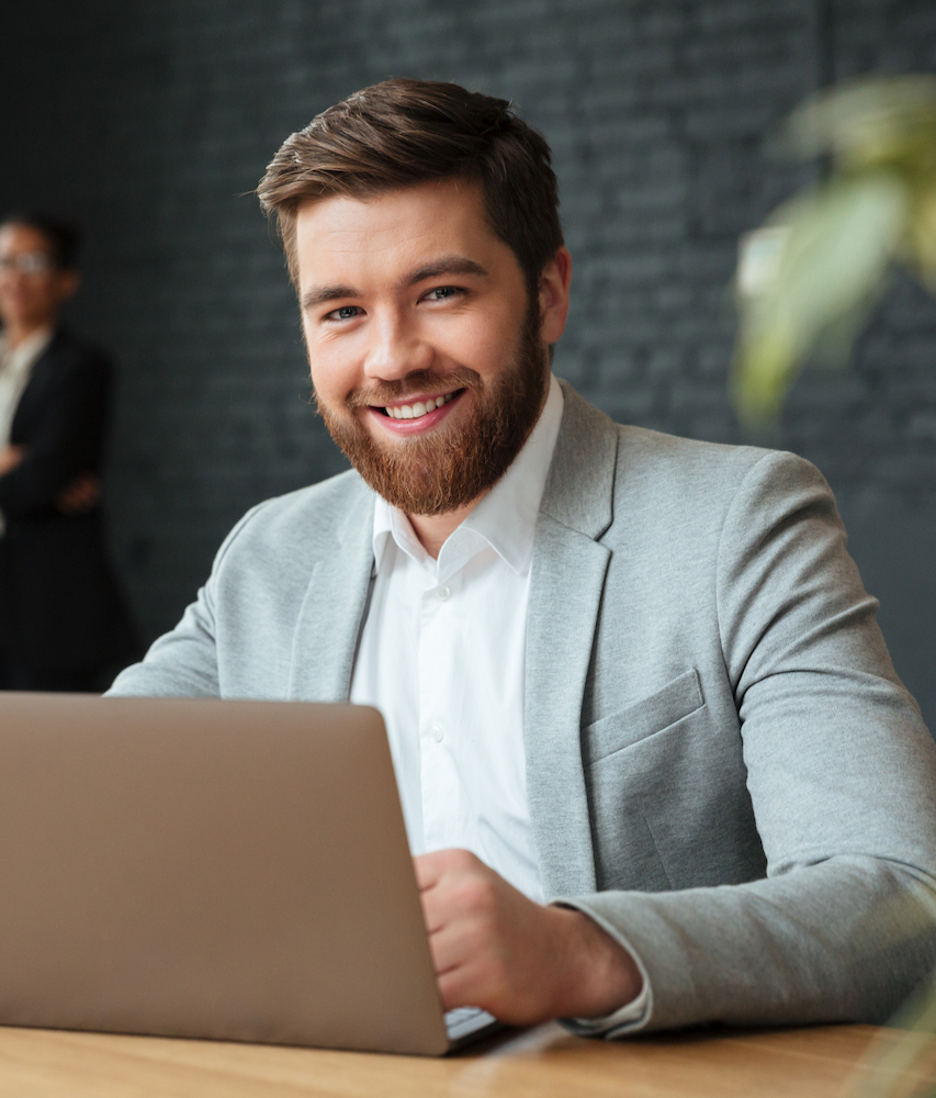 Cheerful young caucasian businessman